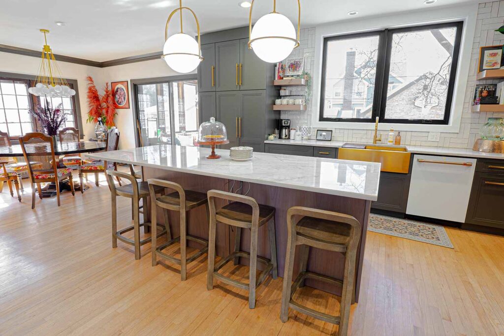 Home addition with extended kitchen and adjacent open concept dining room.