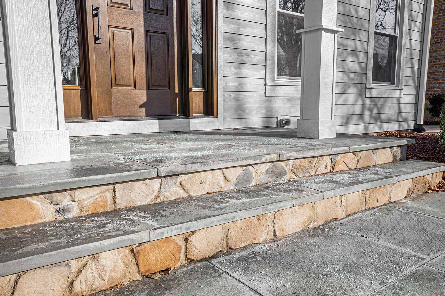 Front porch exterior remodel with new slate steps.