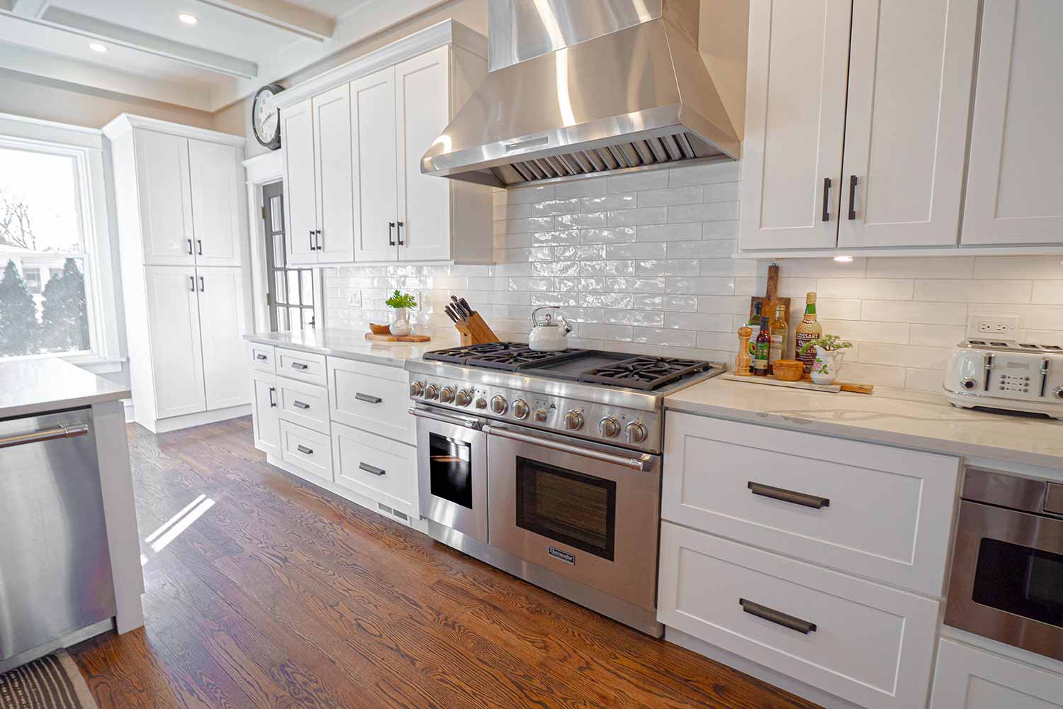 Beautiful open-concept remodeled kitchen by Elik Homes & Construction